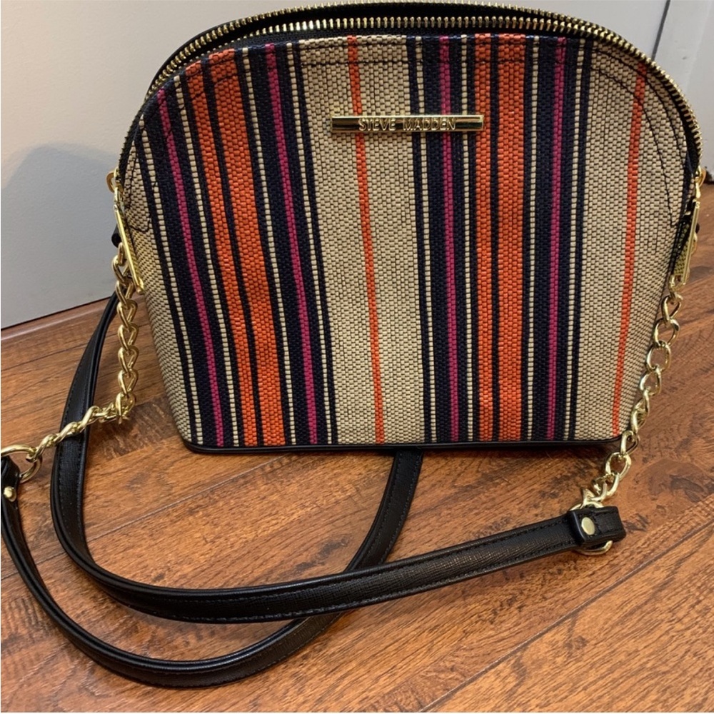 Steve Madden crossbody. Black back, interior & strap. Multicolor striped front